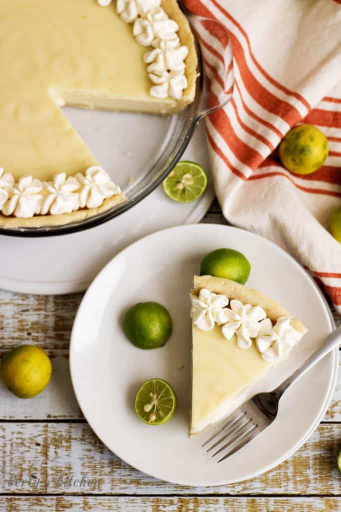 A homemade silky smooth key lime pie that's creamy, sweet, and tangy and is prepared with authentic key lime juice. It's the perfect for pie spring!