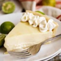 A homemade silky smooth key lime pie that's creamy, sweet, and tangy and is prepared with authentic key lime juice. It's the perfect for pie Spring!