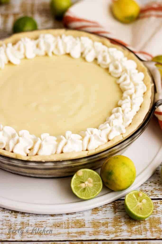 A homemade silky smooth key lime pie that's creamy, sweet, and tangy and is prepared with authentic key lime juice. It's the perfect for pie Spring!