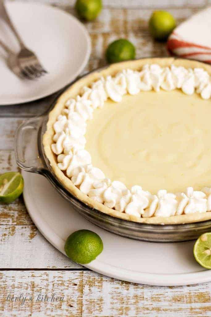 A homemade silky smooth key lime pie that's creamy, sweet, and tangy and is prepared with authentic key lime juice. It's the perfect for pie Spring!