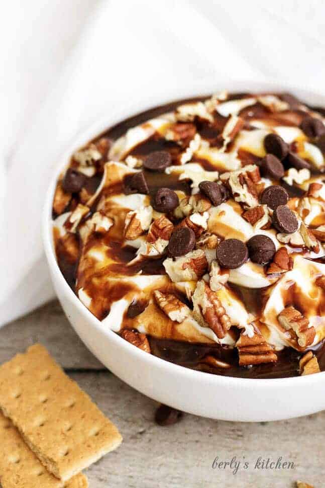 This tempting turtle cheesecake has all the flavor of your favorite creamy dessert including cream cheese, chocolate, caramel, and pecans.
