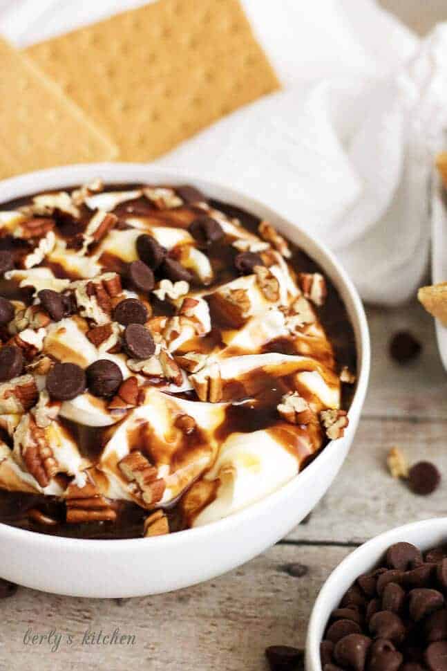 This tempting turtle cheesecake has all the flavor of your favorite creamy dessert including cream cheese, chocolate, caramel, and pecans.