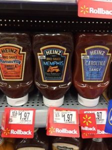 Heinz memphis bbq sauce on a shelf.