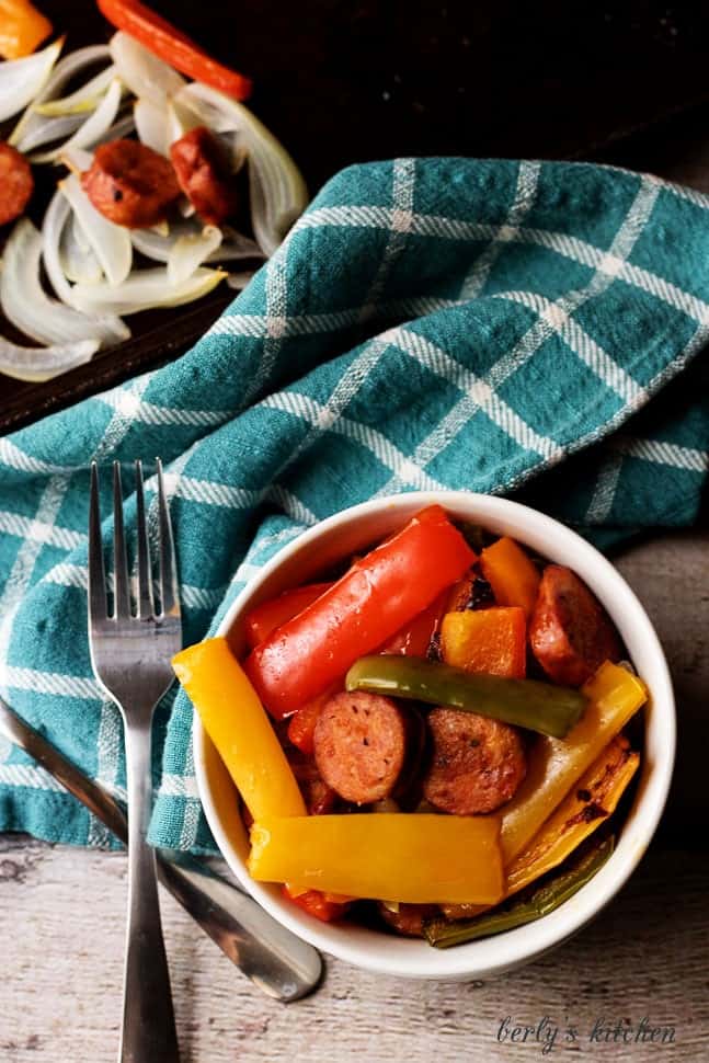 This time-saving sheet pan spicy sausage and peppers recipe is a fantastic idea for a quick, delicious, and filling weeknight meal.