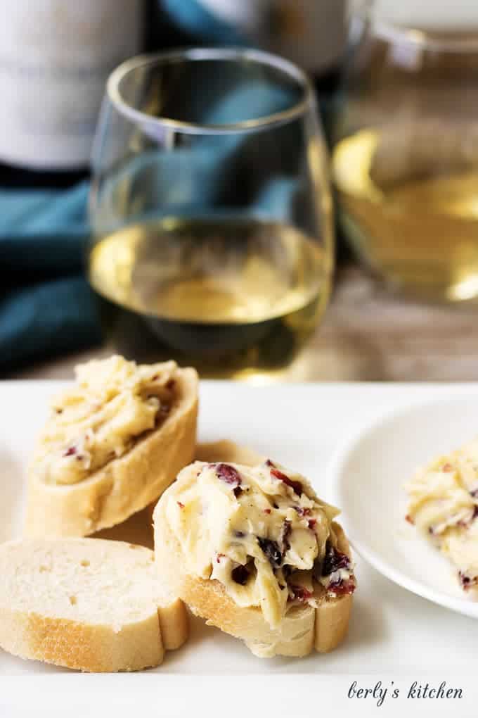 Cheese and bread appetizer and wine.