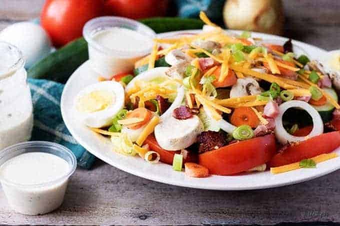 Our copycat classic diner chef salad is a throwback to that perfect entree you just can't seem to find anymore. It's loaded with cheese, ham, and bacon!