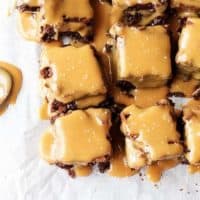 Stove top brownies with salted caramel sauce are thick fudgy brownies topped with a buttery, rich caramel sauce. Sweet and salty makes the perfect pair.