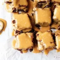 Stove top brownies with salted caramel sauce are thick fudgy brownies topped with a buttery, rich caramel sauce. Sweet and salty makes the perfect pair.