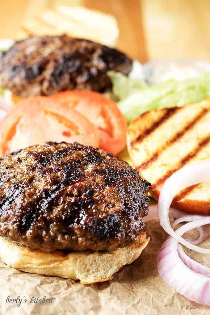 When it comes to making delicious stuffed burgers, it only takes a few key ingredients. Bacon, cheddar, and some choice spices create the ultimate burger!