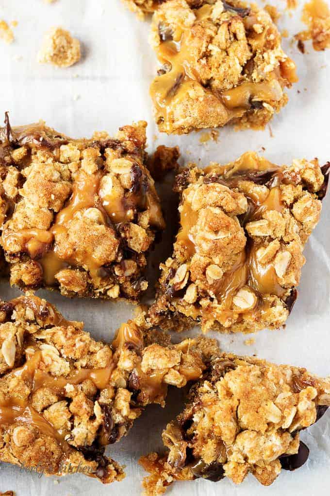 Ooey, gooey, and dripping with caramel, Chocolate Oat Carmelita Bars are the way to satisfy any sweet tooth.  Who can resist a layer of melted caramel and chocolate sandwiched between a shortbread crust and oatmeal topping?