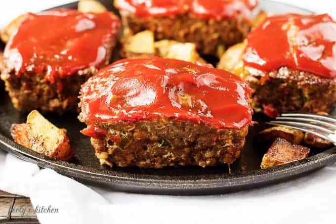 Individual mini meatloaves of savory hamburger meat, seasonings, and zesty ketchup. They're easy to prepare and perfectly pre-portioned.