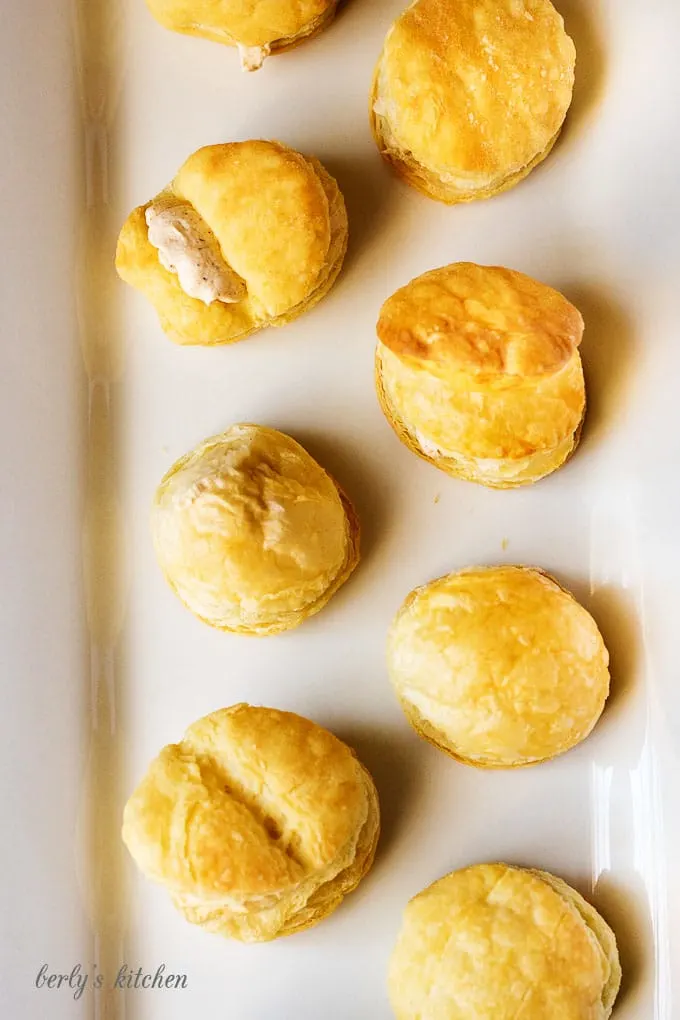 A simple and sweet pumpkin spice filled cream puffs recipe that creates a bite-sized dessert perfect for dinner parties or family get-togethers.