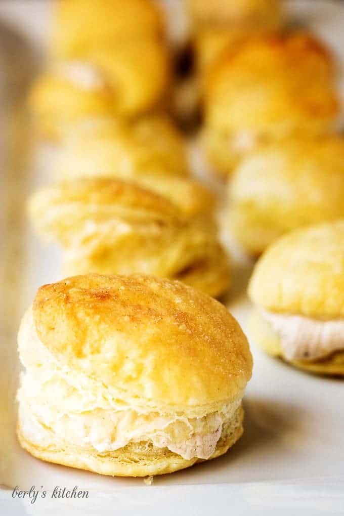 A simple and sweet pumpkin spice filled cream puffs recipe that creates a bite-sized dessert perfect for dinner parties or family get-togethers.
