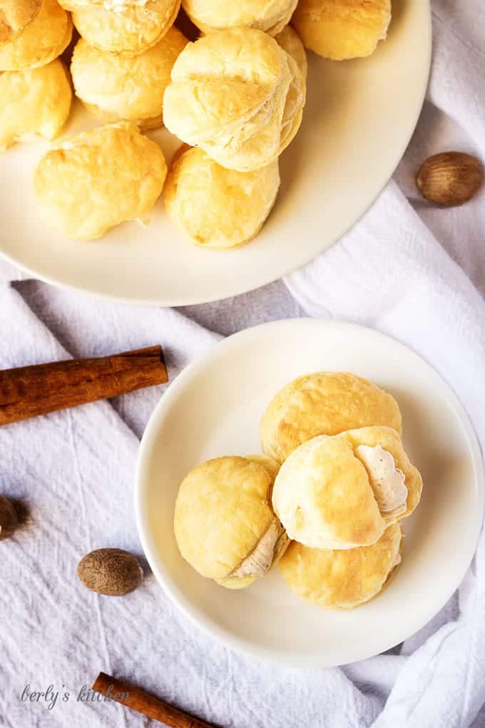 A simple and sweet pumpkin spice filled cream puffs recipe that creates a bite-sized dessert perfect for dinner parties or family get-togethers.