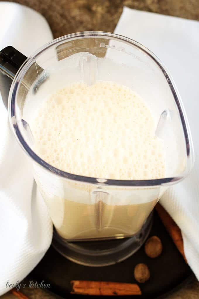 The mixed coquito recipe in a blender, just before being chilled.