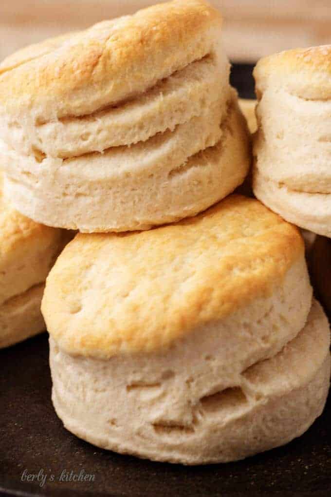 Stack of fluffy homemade buttermilk biscuits.