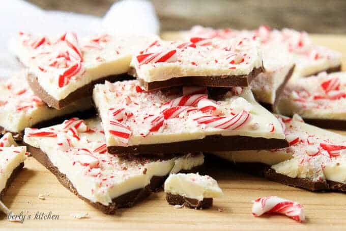 The finished peppermint bark recipe, milk chocolate covered with white chocolate and peppermint candies.