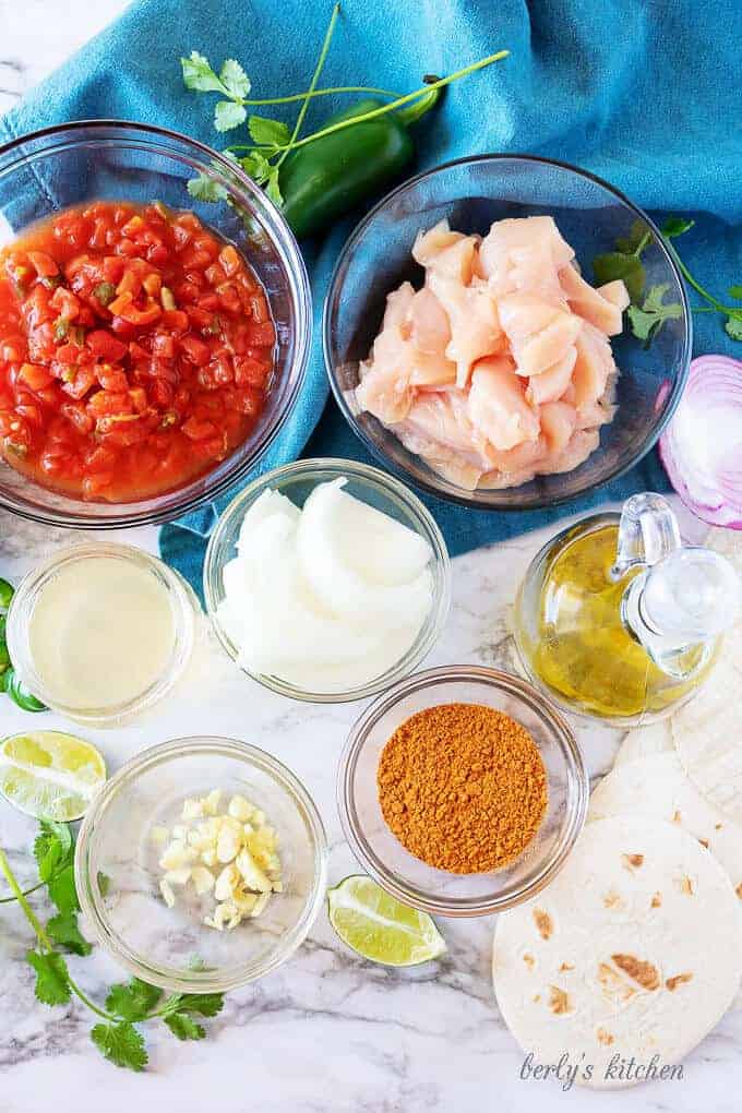 An aerial photo of the raw ingredients like chicken and taco seasoning.