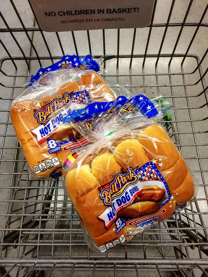 The hot dog buns in our shopping cart at Walmart.