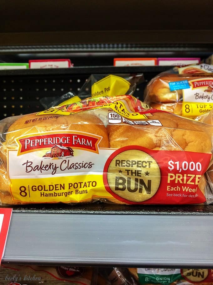 The bakery classic buns sitting on the shelf at our local store.