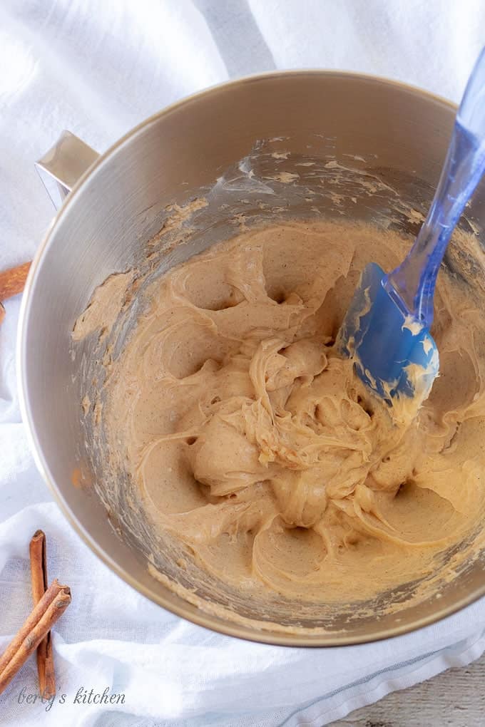 A top-down picture of the cream cheese mixture in a mixing bowl displaying how creamy it should appear.