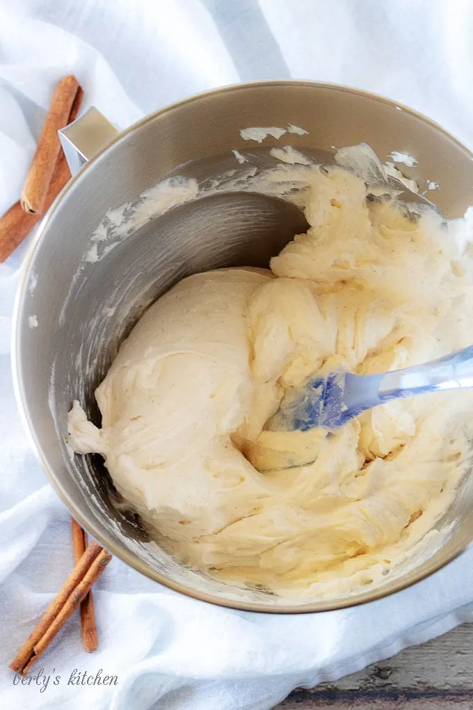 A final process picture showing how the cream cheese mixture and whipped cream should look in a mixing bowl once combined.