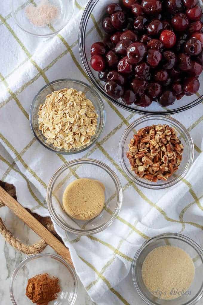 The cherry crisp ingredients like oats, brown sugar, and pecans.