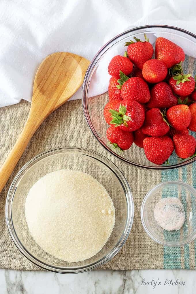 An aerial photo of the four ingredients used in the strawberry sauce.