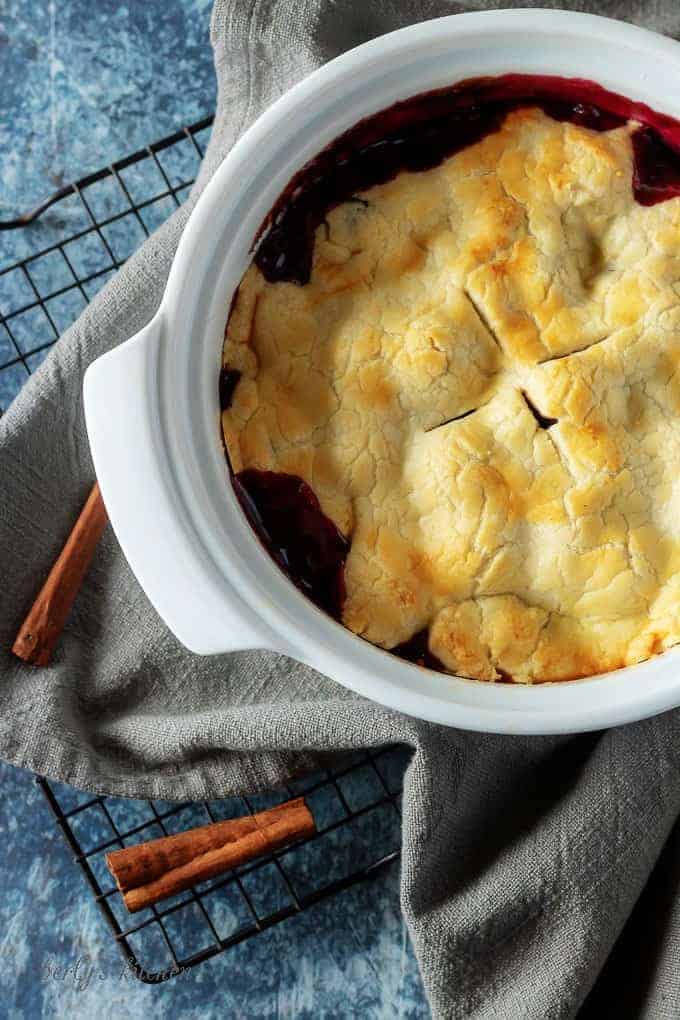 Mixed berry cobbler, perfectly baked with a golden brown crust.