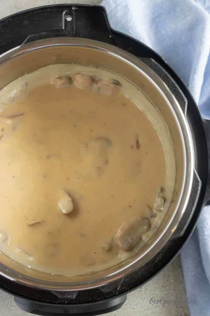 The last instant pot pork chops picture showing the finished mushroom gravy, just before the dish is served.