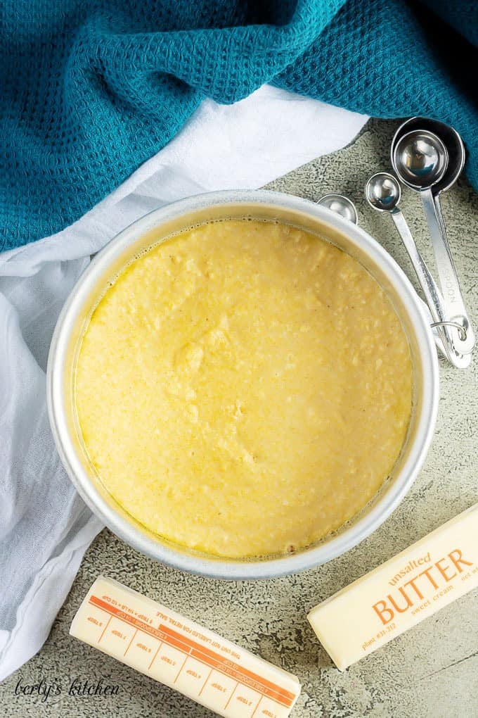 Arial view of buttermilk cornbread batter in a cake pan.