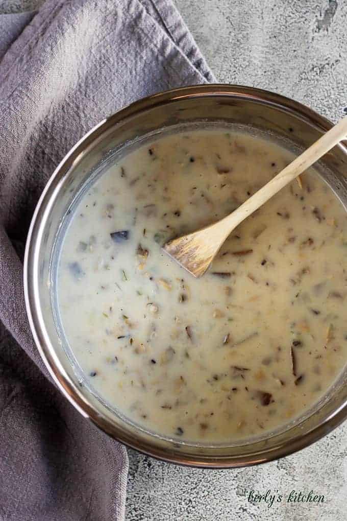 A third top-down picture of the chowder in the cooker after cooking it..