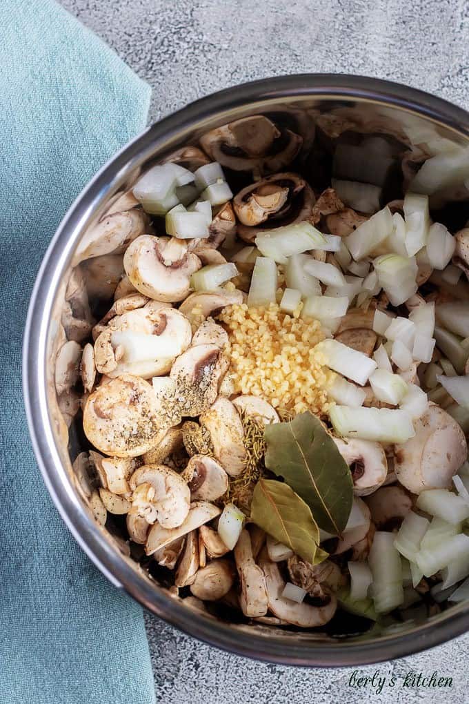 An aerial photo of the ingredients in the instant pot pressure cooker just before sealing.