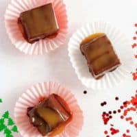 Top down view of three pieces of bourbon caramel fudge.