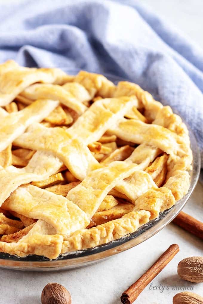 An angled view of the cooked apple pie before it sliced.
