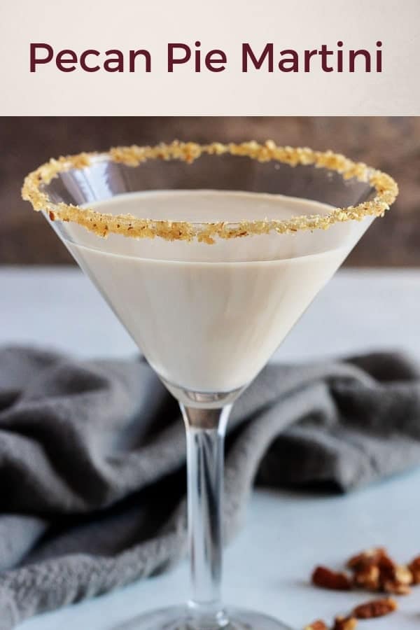 Another close-up photo showing the pecan pie martini in a glass rimmed with brown sugar, maple syrup, and pecans.