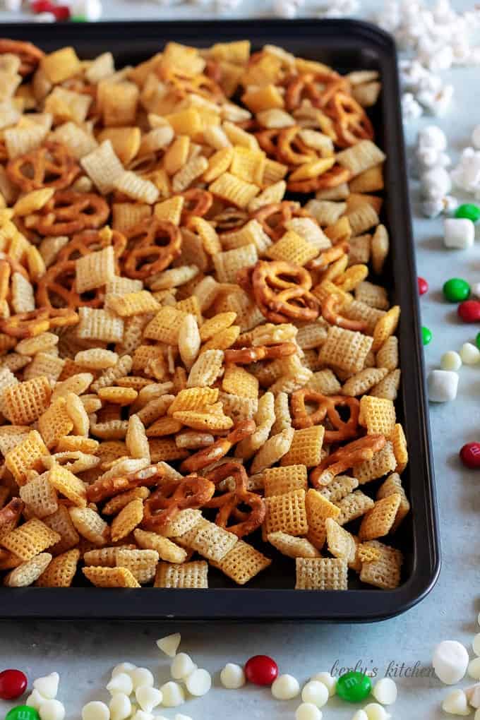 Christmas Chex Mix on a baking sheet.