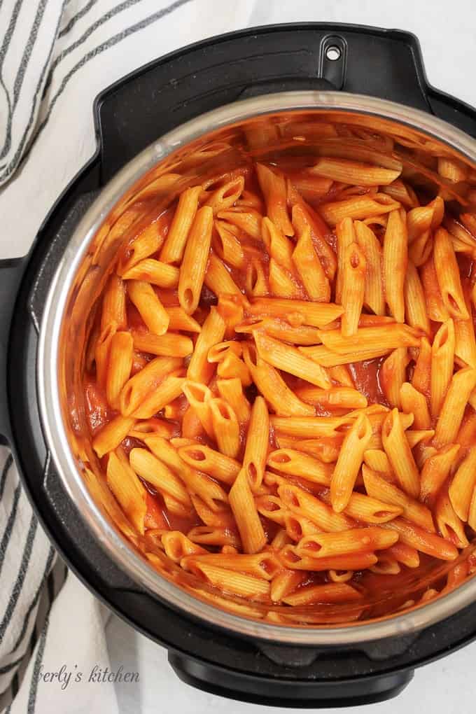 Top down view of penne with vodka sauce in the instant pot.