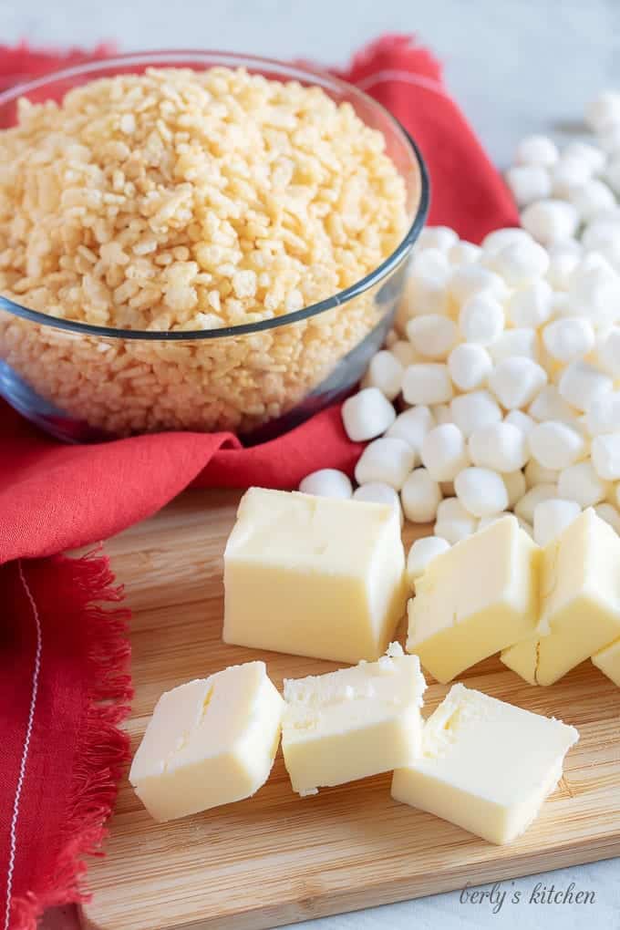 Rice cereal, butter, and marshmallows used for the perfect rice krispie treat recipe.