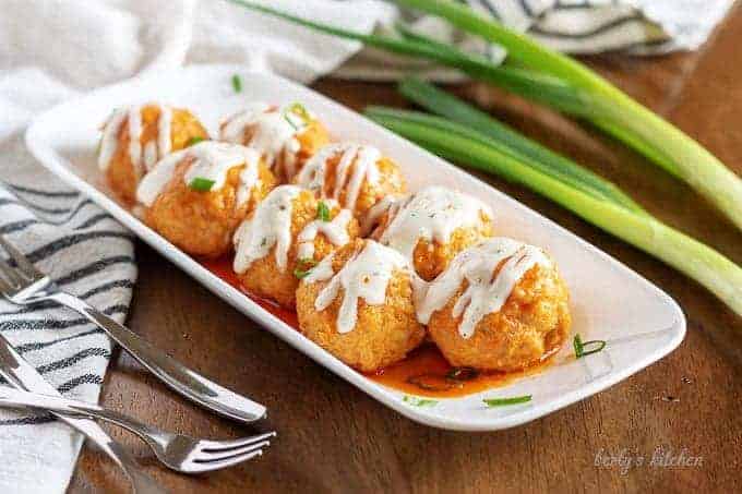 Slow Cooker Buffalo Chicken Meatballs with Ranch Dressing.