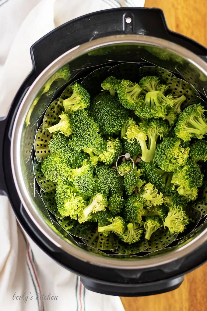 An aerial shot of the steamed broccoli just before it is cooked.