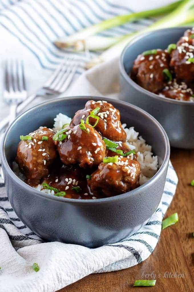 Instant Pot Teriyaki Meatballs with rice in two gray bowls.