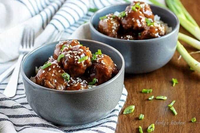 Two bowls of instant pot teriyaki meatballs with rice.