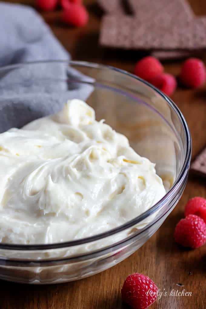 The cream cheese, chocolate, and other ingredients. combined in a mixing bowl.