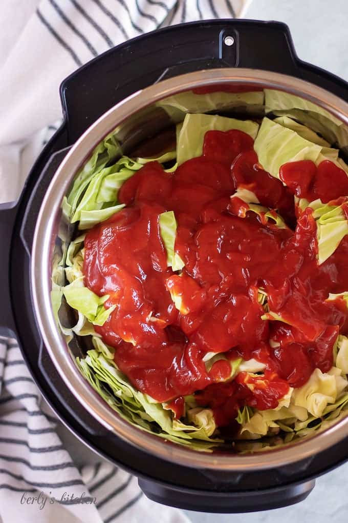 Top down view of instant pot unstuffed cabbage rolls in the instant pot liner.