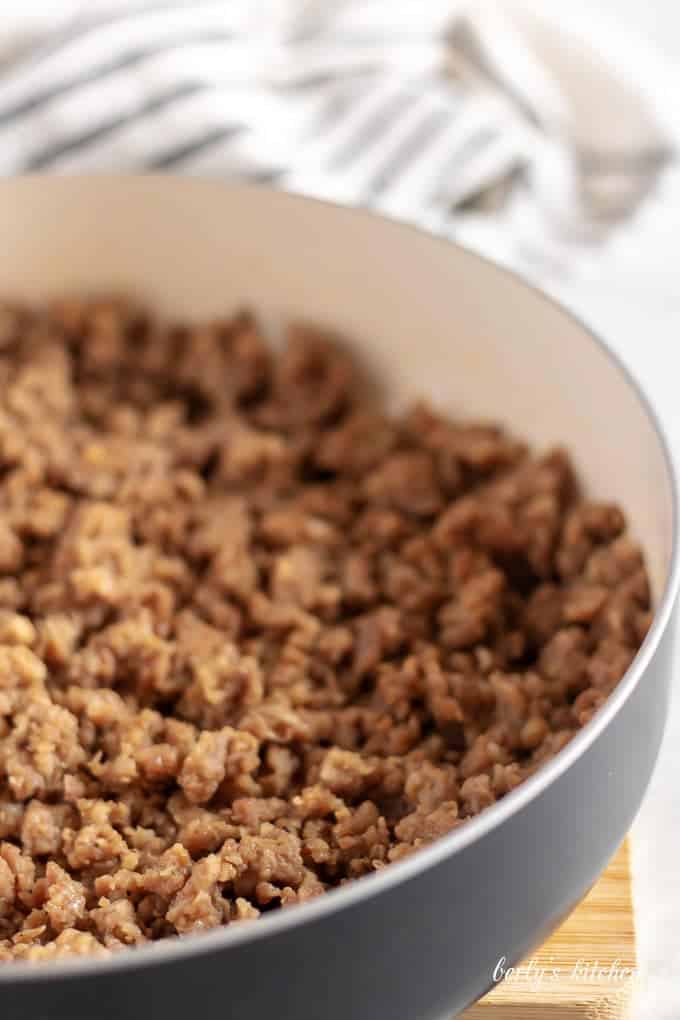 Cooked sausage in a pan just before adding the flour and butter.