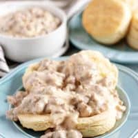Two homemade biscuits,cut in half, and smothered in sausage gravy.