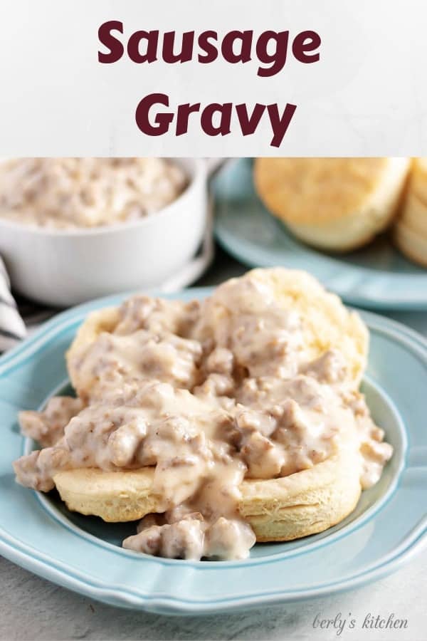 A large photo of the sausage gravy covering two homemade biscuits.
