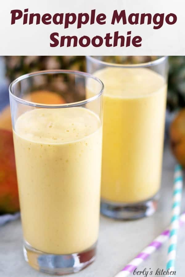 A large photo showcasing two pineapple mango smoothies surrounded by fruit.