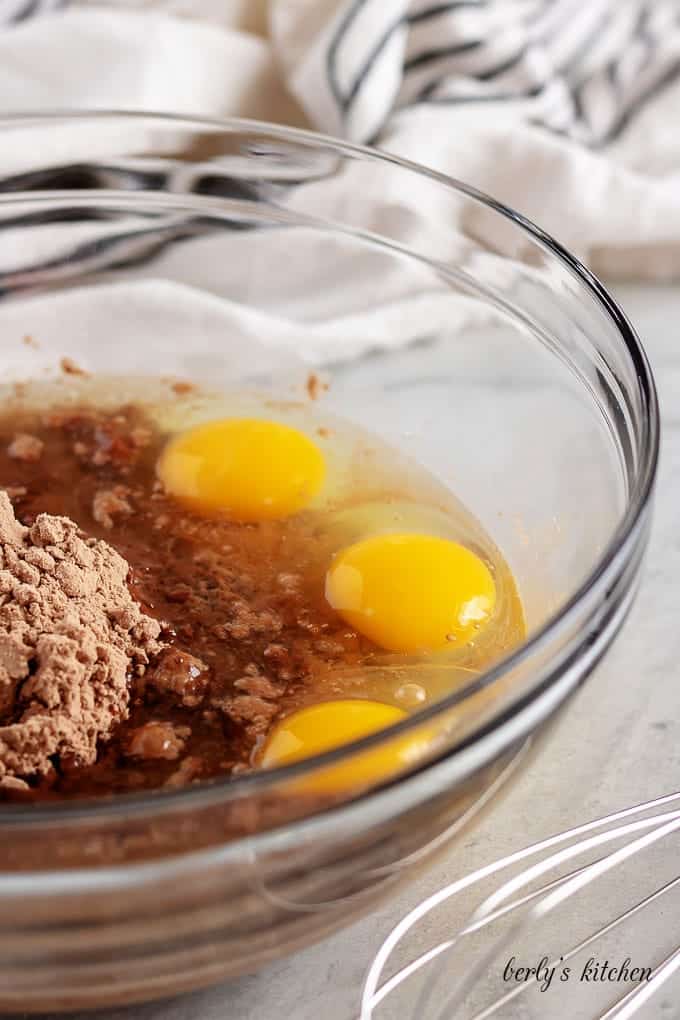 Brownie mix, eggs, and oil, in a large glass mixing bowl.